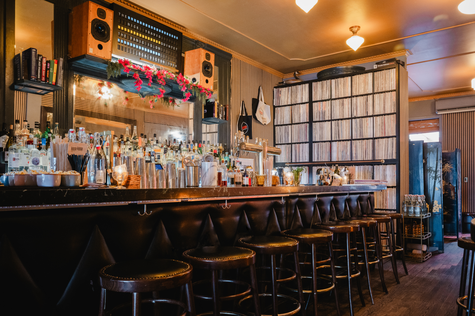 Counter at chest height. The bartender listens.