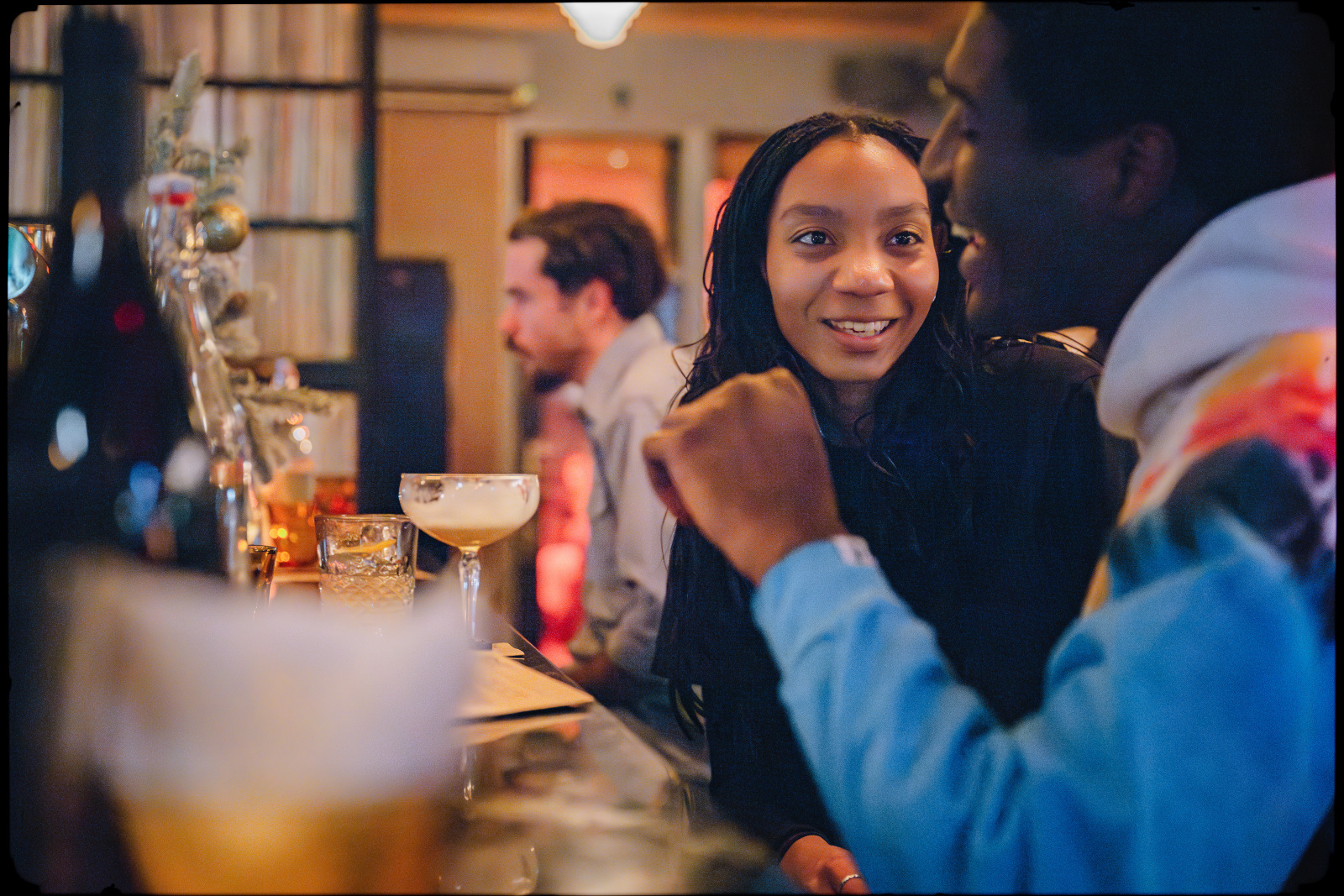 Warm interior ambiance at Kissa Kissa with vinyl records and craft cocktails — NYC listening bar movement in Crown Heights Brooklyn