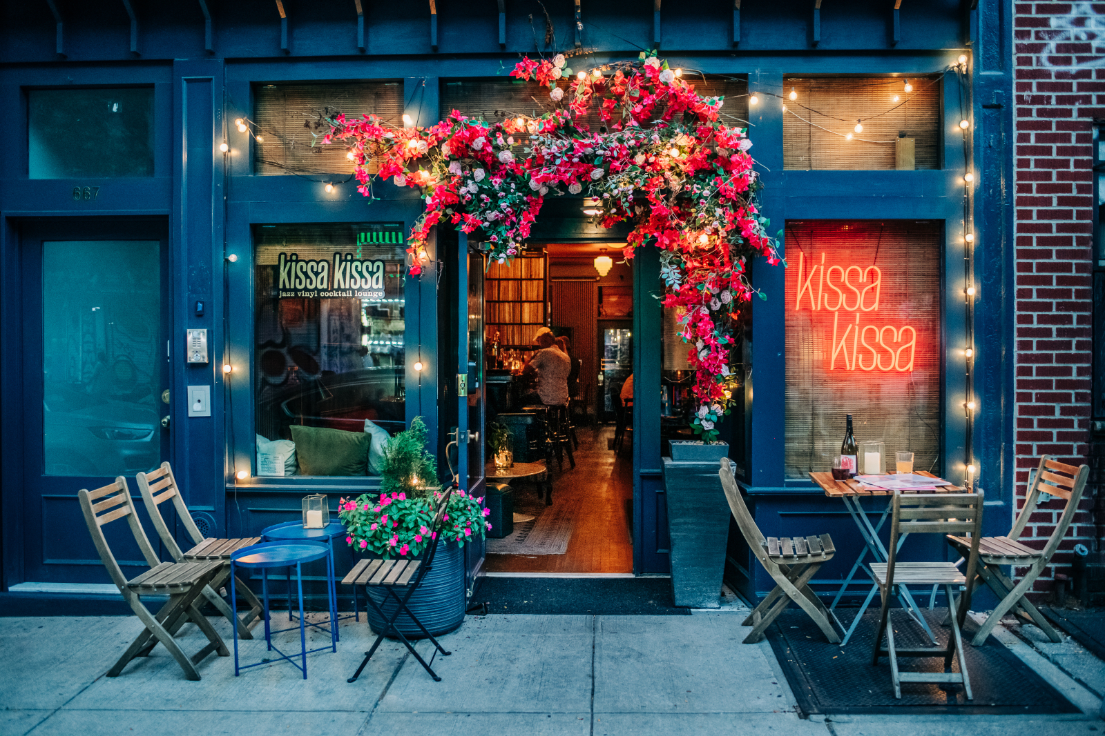 Vinyl turntable spinning a jazz record at Kissa Kissa — analog sound through Harbeth speakers and tube amplifier in Brooklyn