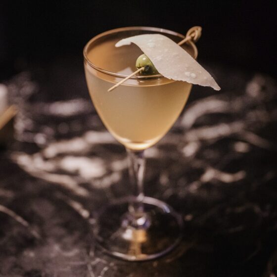 Kissa Kissa | Filthy McNasty - Cilantro infused vodka · sweet pea amaro · carrot · turmeric · ginger · lime | Vinyl jazz cocktail bar | Brooklyn NY USA Neversink gin · Levantine gin · olive leaf liqueur · olive brine · parmesan & olives | Vinyl jazz cocktail bar | Brooklyn NY USA