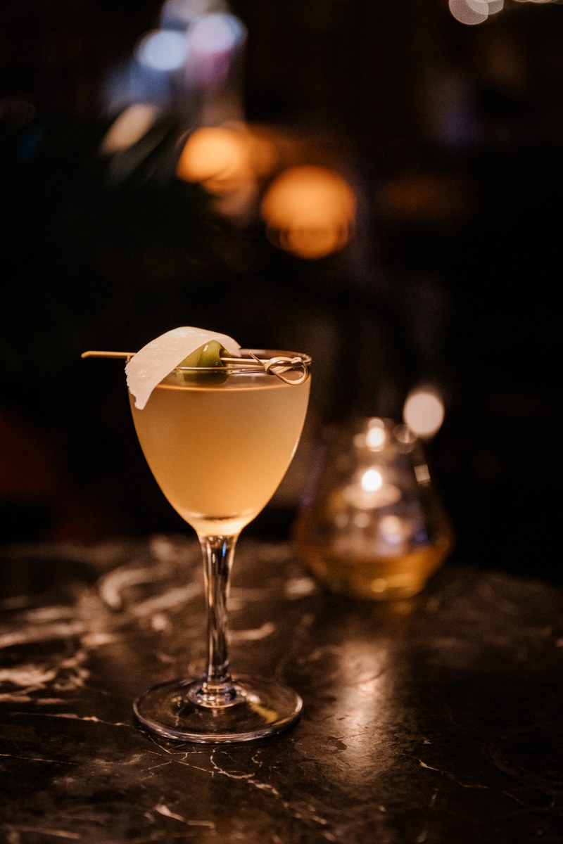 A cocktail on the bar at Kissa Kissa, a jazz vinyl listening bar in Crown Heights, Brooklyn