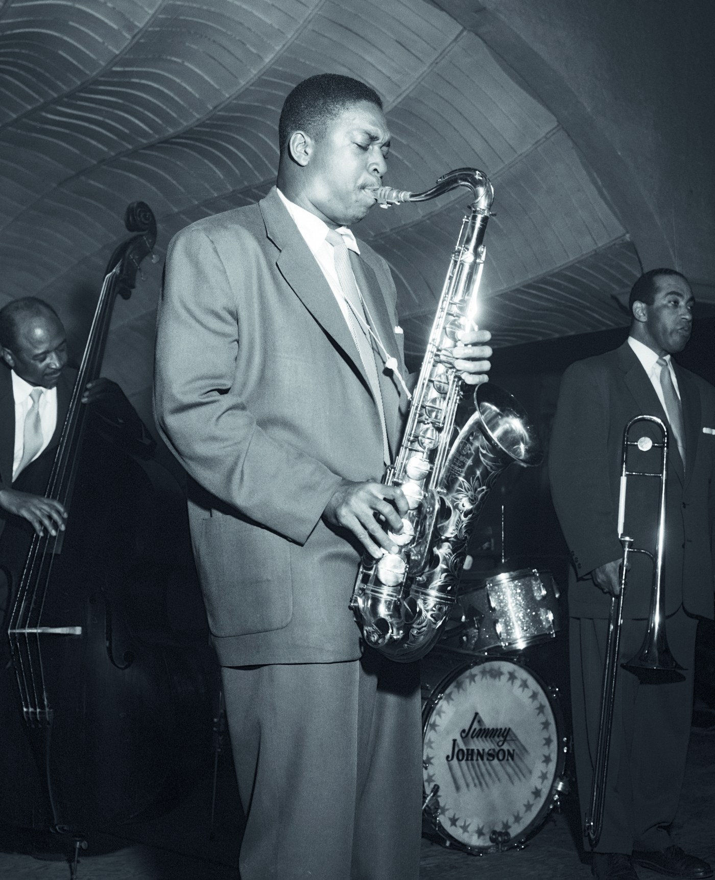 John Coltrane with Lawrence Brown and Johnny Williams in Johnny Hodges' band, 1954, photographed by Carl Henniger