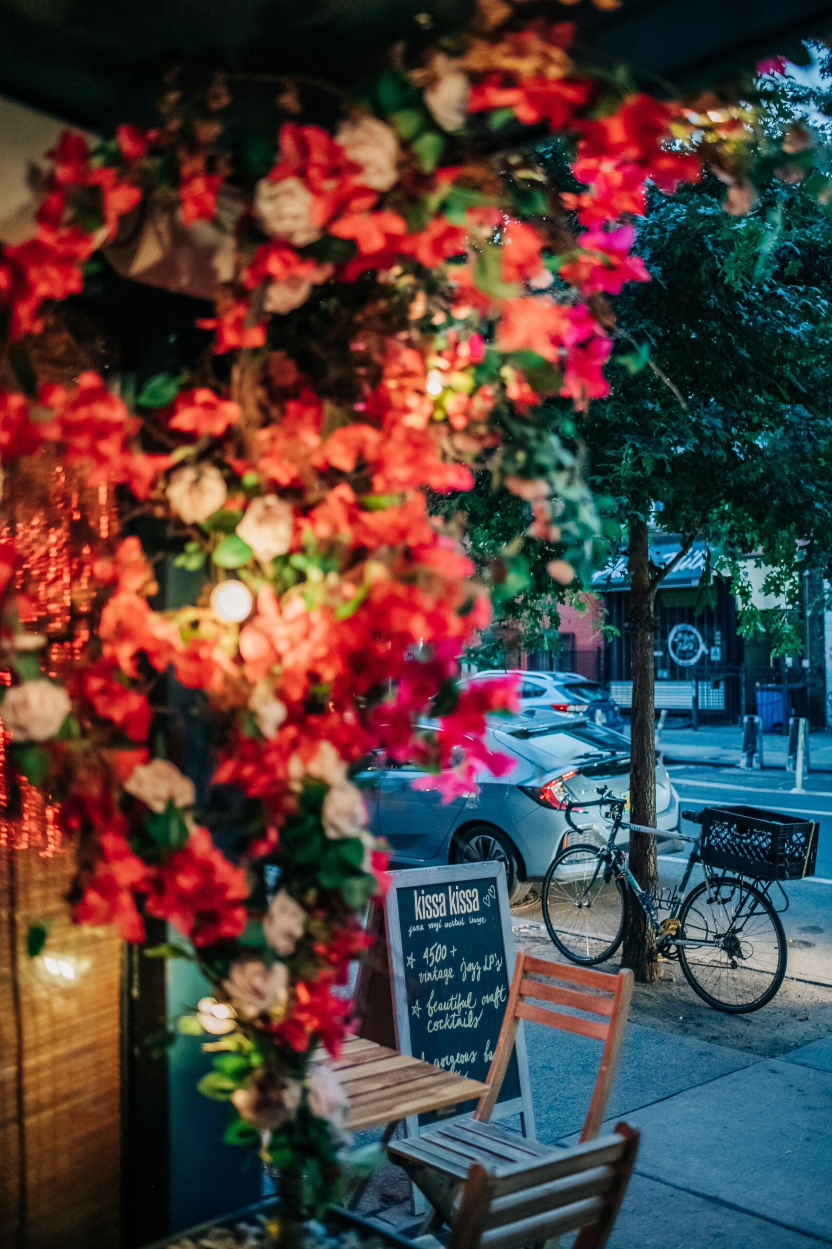 Kissa Kissa — Exterior flowers sidewalk