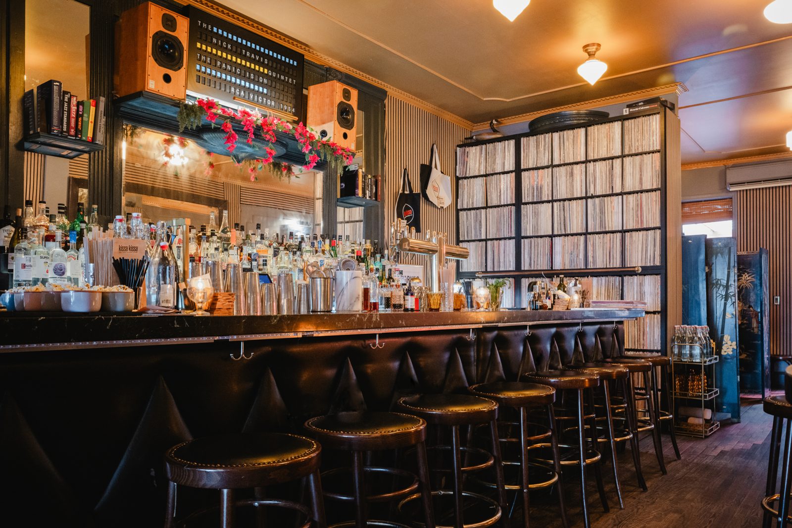 The bar at Kissa Kissa with Harbeth speakers above the back bar and the jazz record wall at right